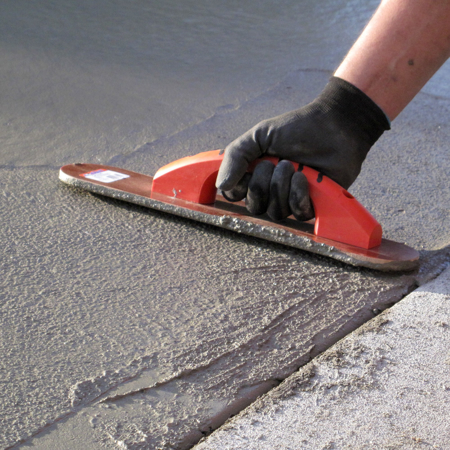 This round end laminated canvas resin hand float has a comfortable proform soft handle. This tool is used to compress resin bound material for a neat finish. Available from Speedcrete, United Kingdom.