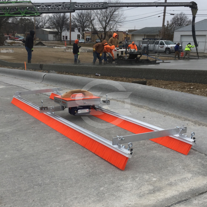 The Chameleon Trac 11 Brush Kit is fed across the concrete via a rope which is pulled by a motor. This applies a brushed finish to concrete across wide bays or areas where poles can not be connected. 
