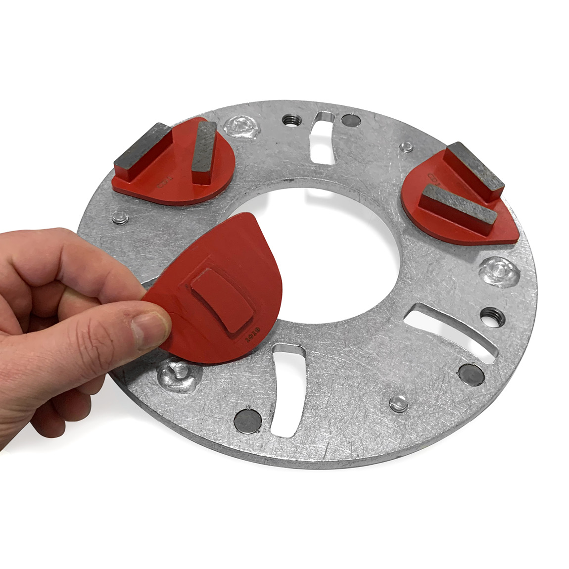 Grinding concrete abrasive holder for magnetic diamond grinding discs. This plate is designed to slot into the planetary arm plate system which can be attached to pedestrian and ride-on concrete trowels.