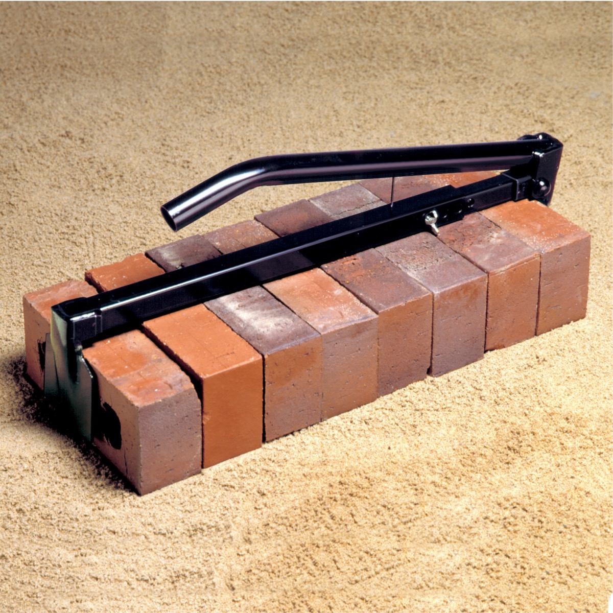 Heavy duty brick clamp, designed for carrying between 6 to 10 bricks at a time. This adjustable brick carrying tool is a time saving device for all professional bricklayers. Available from Speedcrete, United Kingdom.