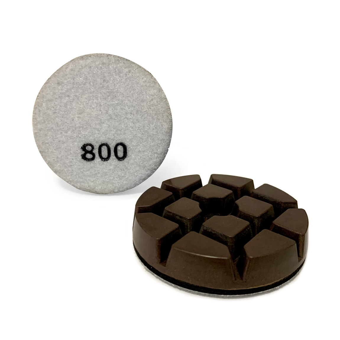 Resin Diamond pucks are used to grind concrete to a polished finish. a selection of grit levels can be velcro attached to a planetary Grinder. Available from Speedcrete, United Kingdom.